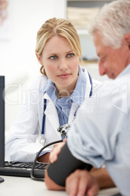 Young doctor with senior patient