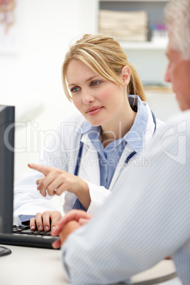 Young doctor with senior patient