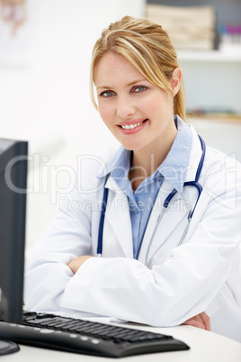 Young doctor at desk