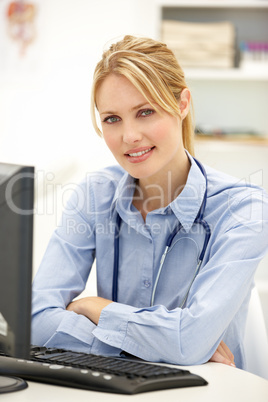 Young doctor at desk