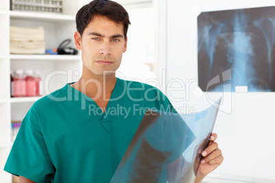 Young male doctor with x-ray