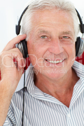 Senior man with headphones