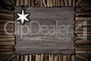 Wooden background with a silverstar