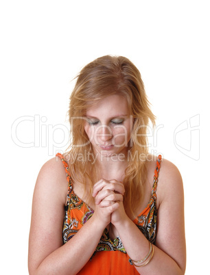 Teen girl praying.