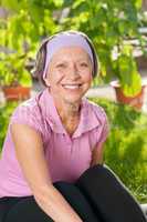 Senior sportive woman smiling outside portrait