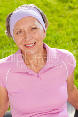 Senior sportive woman smiling outside portrait