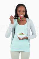 Young woman having a salad