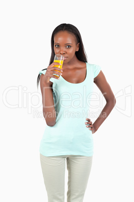 Young woman with a glass of orange juice