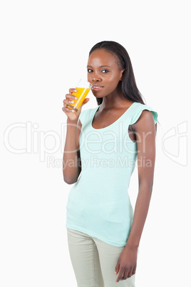 Young female with glass of orange