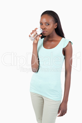 Young woman with a glass of water