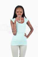 Young woman drinking some water