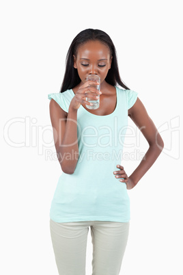 Young female drinking water