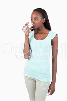 Young female having a sip of water