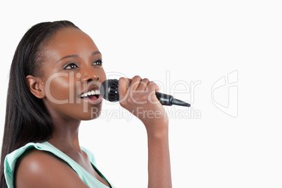 Woman with microphone singing