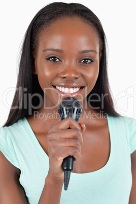 Close up of happy smiling female singer