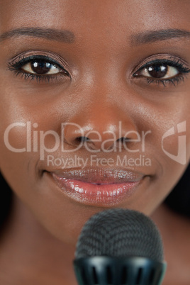 Close up of smiling female singer