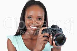 Smiling young photographer