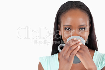 Young woman relaxing with a cup of tea