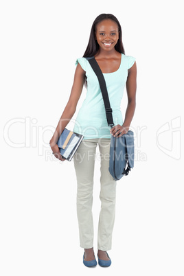 Smiling young student ready for class