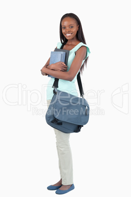 Side view of young female student ready for class