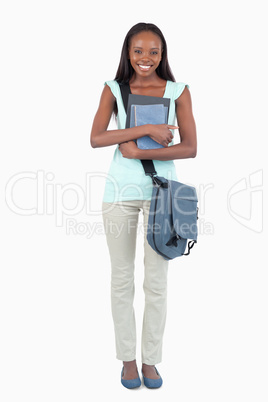 Smiling female student ready for class