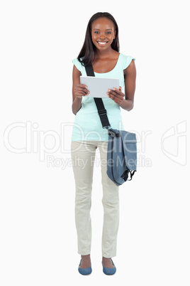 Smiling female student with her notes