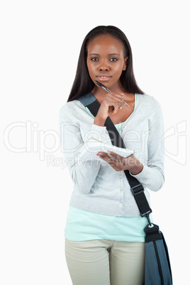 Young female student ready to take notes