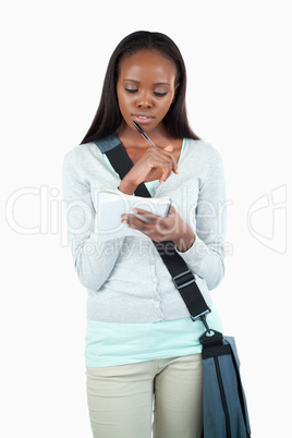 Young student working on her notes