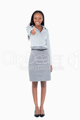 Portrait of a businesswoman with her thumb up
