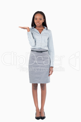 Portrait of a businesswoman presenting something