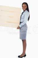 Portrait of a businesswoman holding a panel