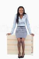 Portrait of a businesswoman sitting on a panel