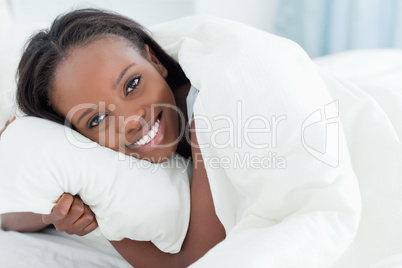 Close up of a young woman waking up