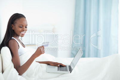 Young woman shopping online