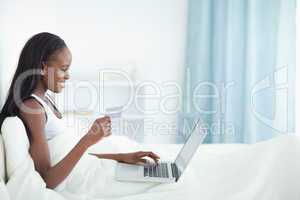 Smiling woman shopping online