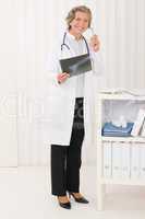 Senior doctor female hold x-ray and phone