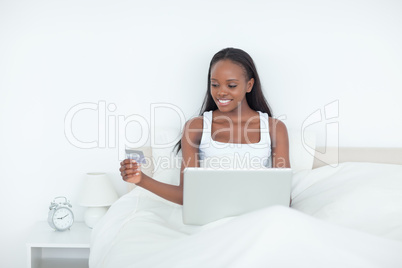 Woman booking her holidays online