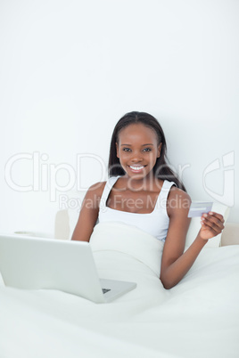 Portrait of a young woman purchasing online