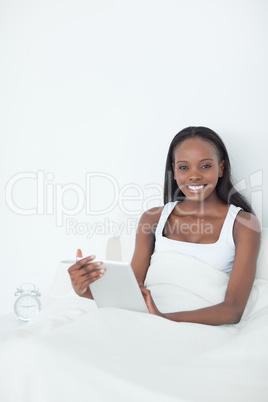 Portrait of a woman using a tablet computer