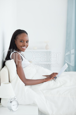 Portrait of a beautiful woman using a tablet computer