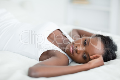 Calm woman lying on her back