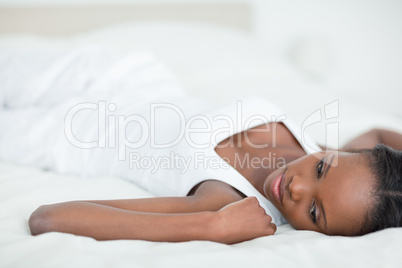 Quiet woman lying on her back
