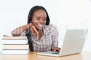 Student woman working with a laptop