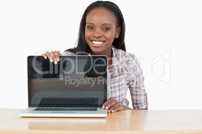 Student woman showing a screen