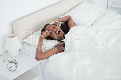 Exhausted woman waking up