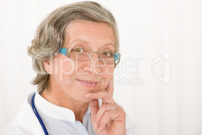 Senior doctor female landsca[e portrait smile