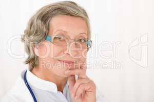 Senior doctor female landsca[e portrait smile