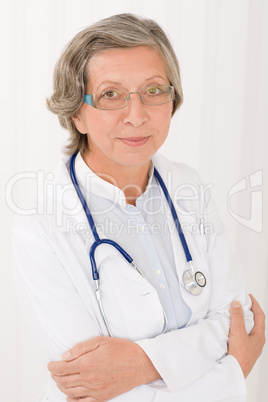 Senior doctor female with stethoscope portrait