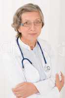 Senior doctor female with stethoscope portrait