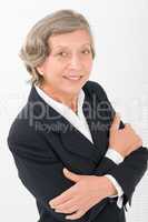 Senior businesswoman crossed arms portrait smart